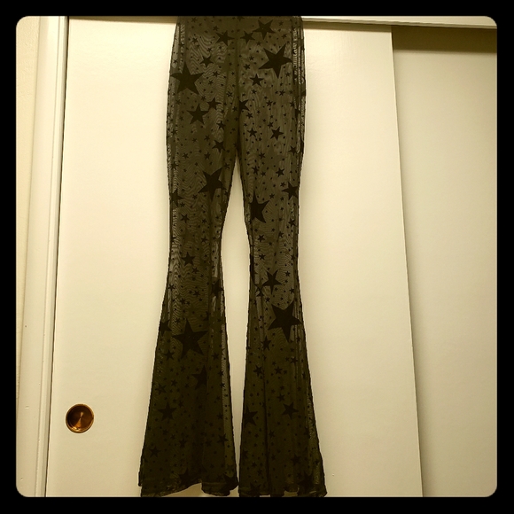 Boohoo Pants - Mesh bell bottom star leggings🖤